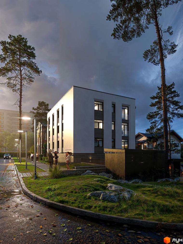 Сучасний житловий комплекс The9 з білою фасадною частиною та великими вікнами. Навколо будинку зелена територія з деревами та доглянутим газоном.