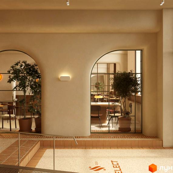 Апарт-готель PRAUD select з арковими проходами та зеленими рослинами всередині. Зовнішній вигляд будівлі з елементами дизайну, що нагадують арки.