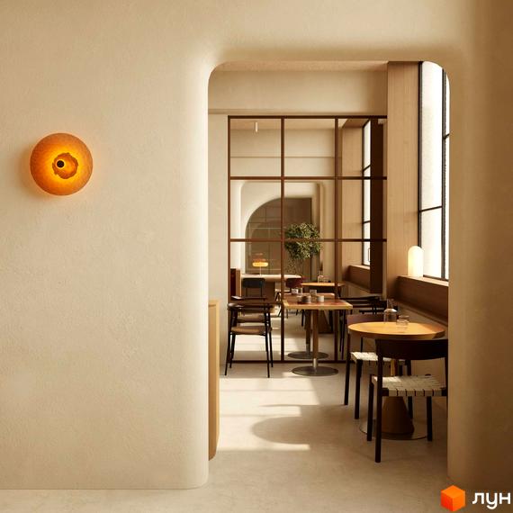 Апарт-готель PRAUD select: затишний інтер'єр з обідніми зонами та природним освітленням. Дизайн інтер'єру з акцентом на комфорт та функціональність.