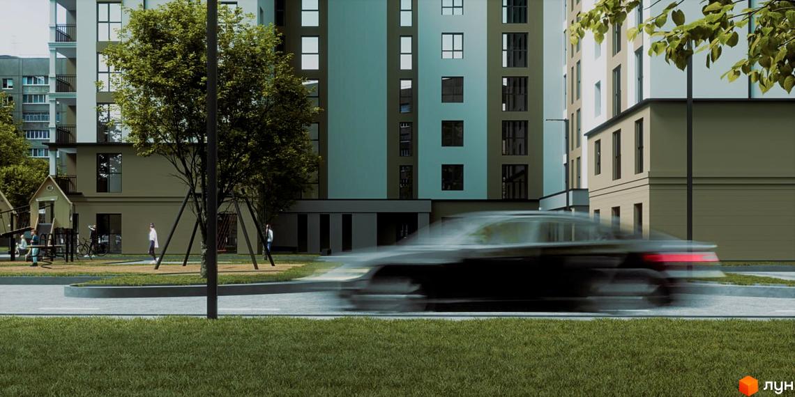 Житловий комплекс Відродження: фасади будівель та прибудинкова територія з дитячим майданчиком та деревами. Автомобіль проїжджає повз.