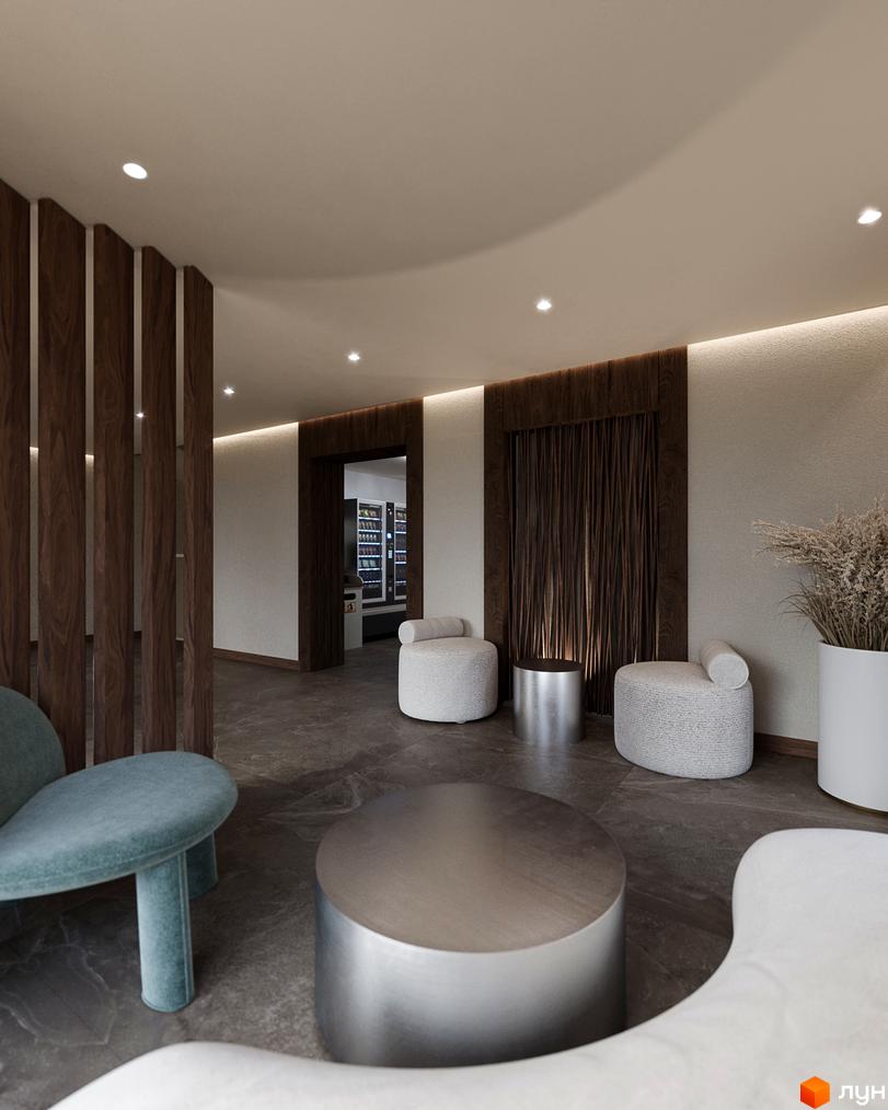 Інтер'єр зони відпочинку в житловому комплексі Volytsia Village Spa з м'якими кріслами та кавовим столиком. Сучасний дизайн простору для релаксу.