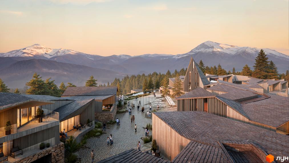 Котеджне містечко КМ Kryla Karpaty by Edem з дерев'яними фасадами та кам'яною кладкою на тлі гірського пейзажу. Територія комплексу з бруківкою та зонами відпочинку.