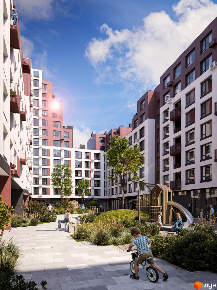 Житловий комплекс Зоряні. Сучасна архітектура з балконами та великими вікнами, зелена прибудинкова територія з дитячим майданчиком та місцями для відпочинку.