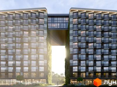 Екстер'єр житлового комплексу Space з аркою між двома корпусами, що з'єднані скляним переходом. Зелені насадження вздовж фасадів та прибудинкова територія з деревами.