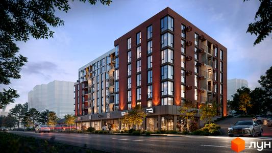 Новобудова SVOÏ INSPIRO з червоною цегляною фасадною частиною та великими вікнами, розташована біля дороги з автомобілями та зеленими деревами.