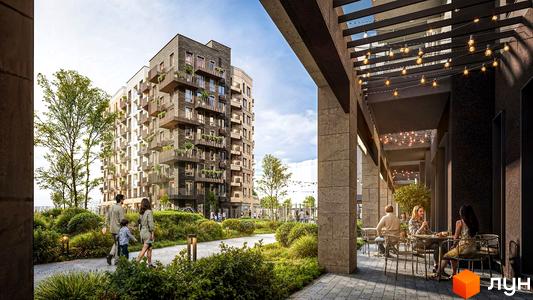 Житловий комплекс Atmosfera Premium з балконами та зеленою прибудинковою територією. Люди відпочивають на терасі біля будинку.