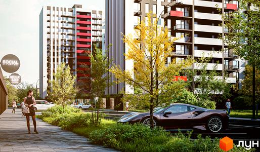 Житловий комплекс Family Plaza 2: сучасні будинки з червоними та білими фасадами, балконами та панорамними вікнами, поруч зелена зона з деревами та припаркованими автомобілями.