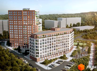 Житловий комплекс Величковського 7-Б з цегляними та білими фасадами, балконами та прибудинковою територією з дитячим майданчиком та парковкою.