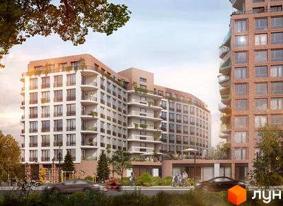 Житловий комплекс Величковського 7-Б з фасадами білої штукатурки та цегли, балконами та прибудинковою територією з дитячим майданчиком.