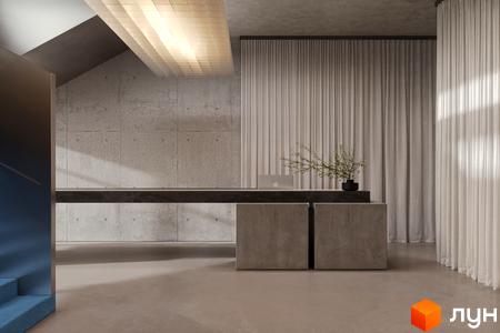 Інтер'єр лобі Circle hotel&apartments: бетонні стіни, довга стійка, світлі штори та декоративна рослина. На задньому плані сходи.