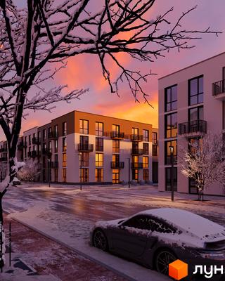 Зовнішній вигляд житлового комплексу Парксайд на фоні зимового пейзажу. Прибудинкова територія з засніженими деревами та автомобілем.
