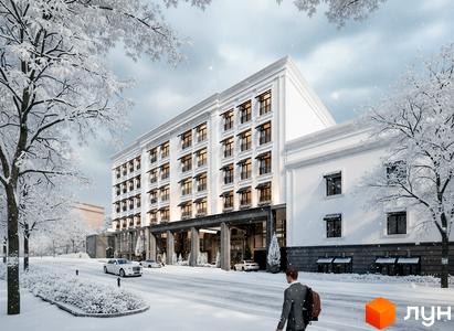 Житловий комплекс MIY by Five Forces з фасадом у світлих тонах та прибудинковою територією, засніженою взимку.