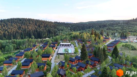 Котеджне містечко PHOENIX MEDICAL RESORT з дерев'яними будинками та чорними дахами, розташоване серед лісу біля басейну та зони відпочинку.