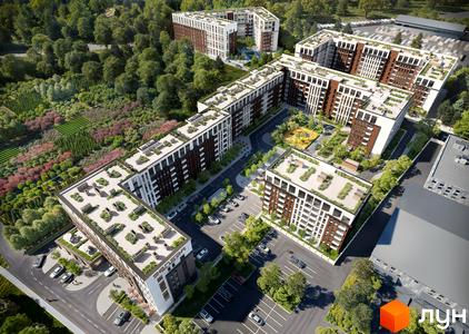Зовнішній вигляд житлового комплексу Smart City з багатоповерховими будинками та доглянутою прибудинковою територією з зеленню та зонами відпочинку.