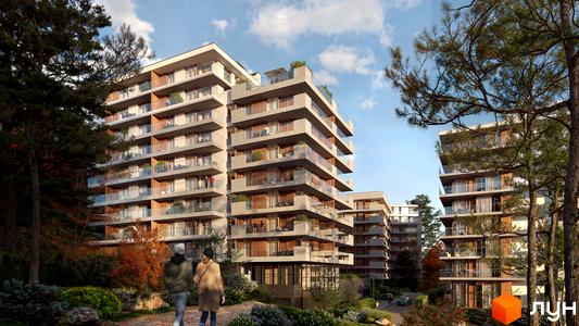 Житловий комплекс MARVEL Hill – це багатоповерхові будинки з балконами та скляними огорожами, оточені зеленою прибудинковою територією з деревами та доріжками.