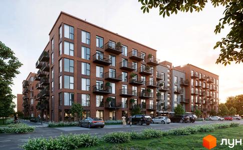 Житловий комплекс Prostir з цегляними фасадами та балконами, розташований серед зелених насаджень і парковки.