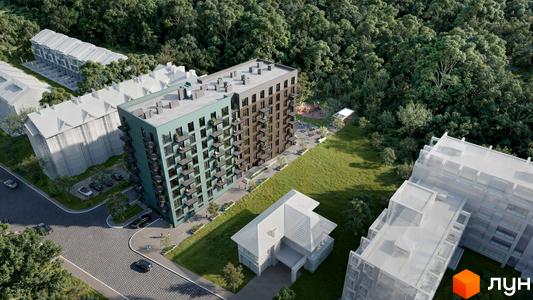 Житловий комплекс Kaiser Forest з зеленим та коричневим фасадами, балконами та прибудинковою територією з деревами та дитячим майданчиком. Оточений лісом.