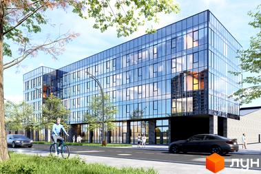 M6 Urban Residence – новобудова з панорамним склінням та сучасною архітектурою, поруч зелена зона та дорога з автомобілями.