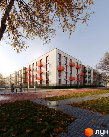 Зображення фасаду та прибудинкової території Житлового комплексу Парксайд. На передньому плані зелений газон з опалим листям та тротуарна плитка.