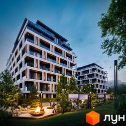 Житловий комплекс GLOBUS ECLIPTICA з балконами та скляними огорожами, оточений деревами та зоною відпочинку з вогнищем.