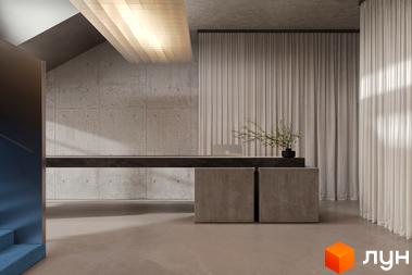 Інтер'єр лобі Circle hotel&apartments: бетонні стіни, довга стійка, світлі штори та декоративна рослина. На задньому плані сходи.