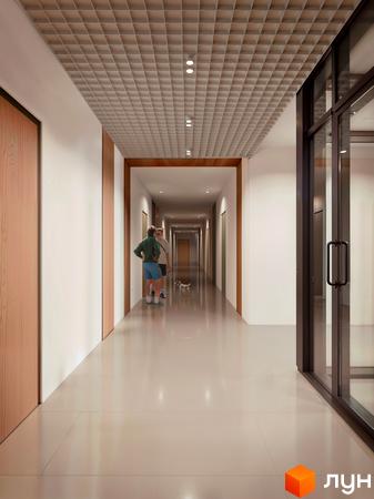 Інтер'єр коридору новобудови Величковського 7-Б з дерев'яними елементами та підлогою з плитки. Двоє чоловіків та собака стоять у коридорі.