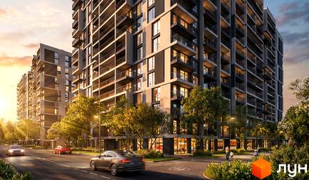 Житловий комплекс Comfort Park 2 з балконами та вікнами, що виходять на дорогу та зелену зону з деревами.