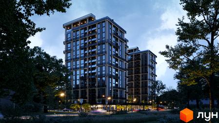 Житловий комплекс PARK AVENUE premium із темними фасадами та підсвіткою, оточений деревами та освітленою вулицею.