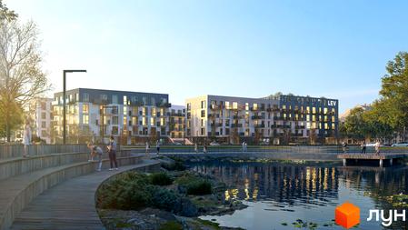 Новобудова ЖК VERO з балконами та великими вікнами, розташована біля водойми з облаштованою набережною для відпочинку та занять спортом.