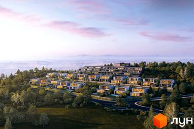 Lion Hills Villas – це житловий комплекс з багатоквартирним будинком та віллами з великими вікнами, розташований на схилі пагорба. Територія оточена густою зеленню та має дороги, що ведуть до осель.
