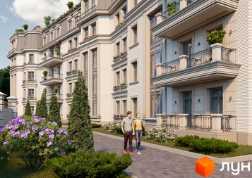 Зображення фасаду Клубного будинку „Консул“ з балконами та великими вікнами. На передньому плані квітучі кущі та доглянуті дерева.