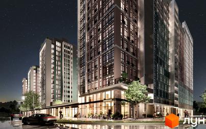 Нічна панорама житлового комплексу Феофанія City з високими будинками та освітленими вікнами. Біля комплексу розташовані автомобілі та пішохідні доріжки.