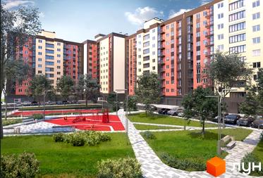 Житловий комплекс Одеська Чайка (Сахарова). Багатоповерховий будинок з фасадом з цегли та світлими вставками. На території дитячий майданчик та зелені зони.