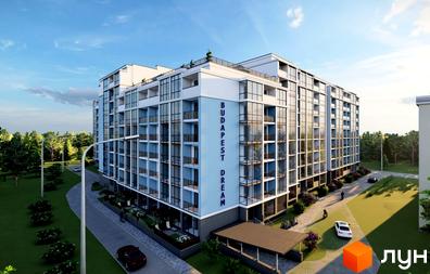 Фасад Житлового комплексу Budapest Dream виконаний у світло-блакитних та білих тонах з великими вікнами. Прибудинкова територія має зелені газони та дорогу.