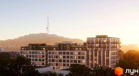 Високоповерховий будинок ЖК Lypynsky з великими вікнами та балконами. На фоні видно пагорб з телевежею та зелені насадження.