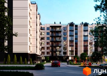 Новобудова ЖК Європейські Липки з сучасним фасадом та балконами. На прибудинковій території дитячий майданчик та червоний автомобіль.