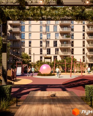 Новобудова ЖК ЛЮМ з балконами та великими вікнами, на прибудинковій території дитячий майданчик та зона відпочинку.