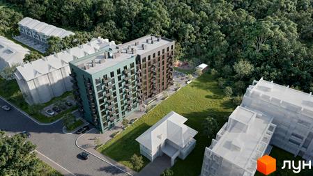 Житловий комплекс Kaiser Forest з зеленим та коричневим фасадами, балконами та прибудинковою територією з деревами та дитячим майданчиком. Оточений лісом.