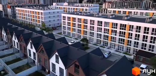 Житловий комплекс Sanville Park з будинками різної поверховості. На передньому плані котеджі з темними дахами, позаду багатоповерхові будинки з великими вікнами.